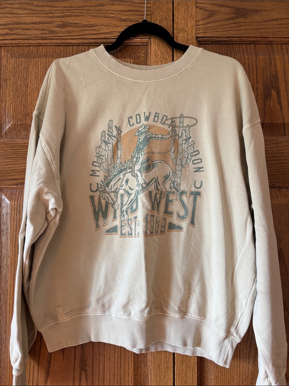 Graphic 'Wild West' Cowboy Sweatshirt in Beige and Teal